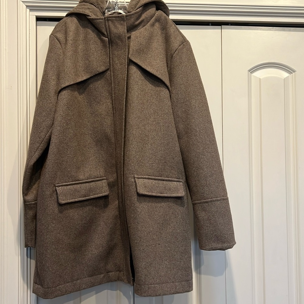 Woman’s Taupe Coat.